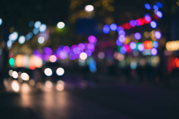 istock Abstract defocused city street scene at night 666559140
