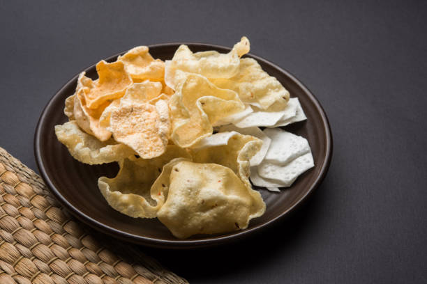 istock variety of Indian snack deep fried and roasted papad 666559662