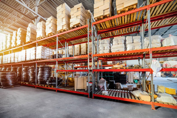 istock Long shelves with a variety of boxes and containers 666559842