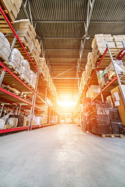 istock Long shelves with a variety of boxes and containers 666562838