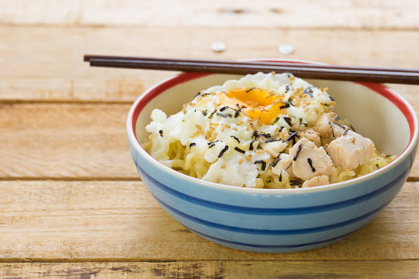 istock Korea Instant Noodles in Ceramic Bowl with Chopstick on Wood Table Daylight 666562874