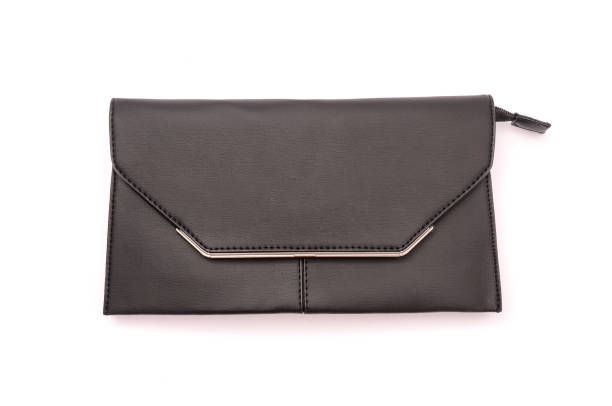 istock Black leather clutch isolated on white 666563160