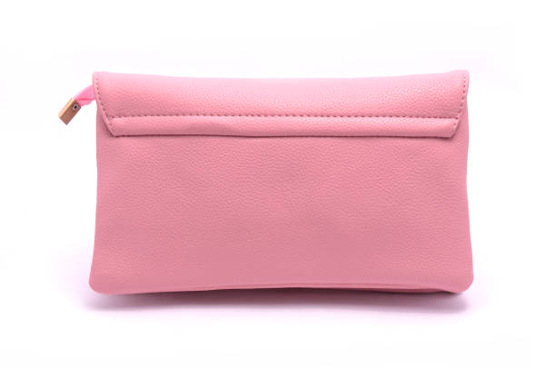 istock Pink leather clutch isolated on white 666563226