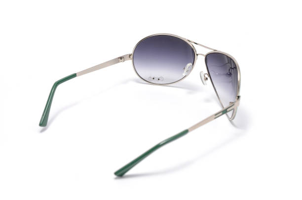 istock Sunglasses in green iron frame isolated on white 666566644