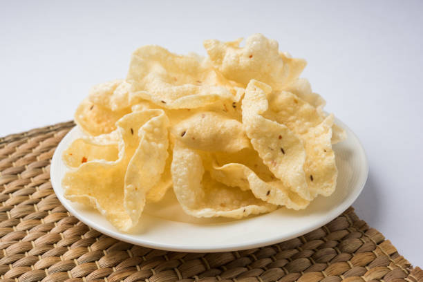 istock variety of Indian snack deep fried and roasted papad 666569630