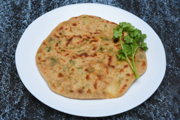 istock Palak Paratha or Cheese parantha, Indian flat bread food 666569722