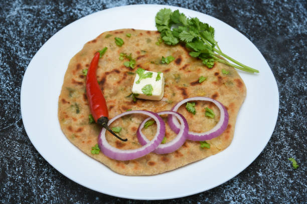 istock Palak Paratha or Cheese parantha, Indian flat bread food 666570042