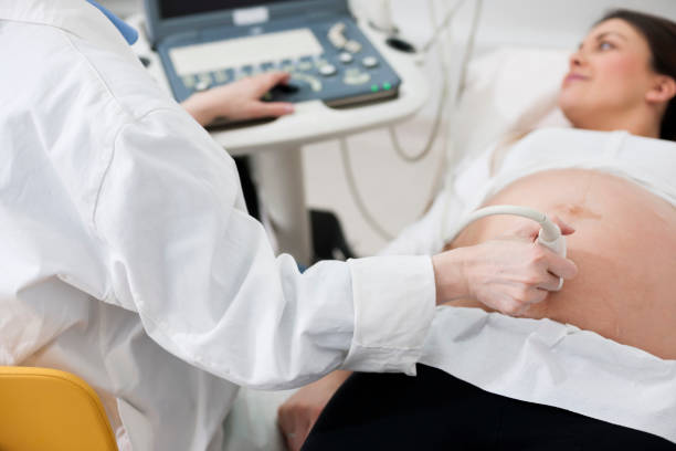 istock Pregnancy ultrasound in doctors office 666573390
