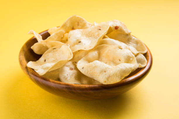 istock variety of Indian snack deep fried and roasted papad 666573572