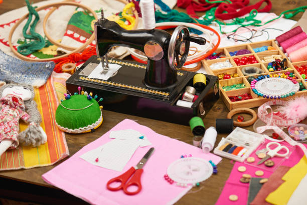istock sewing accessories top view, seamstress workplace, many object for needlework, embroidery, handmade and handicraft 666582852