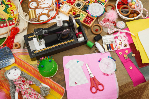 istock sewing accessories top view, seamstress workplace, many object for needlework, embroidery, handmade and handicraft 666583160