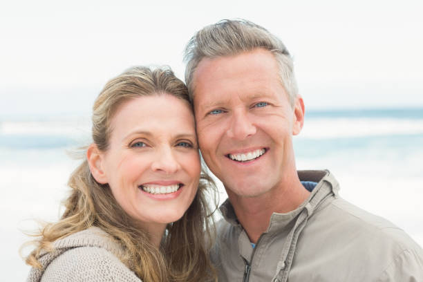 istock Smiling couple holding one another 666586634