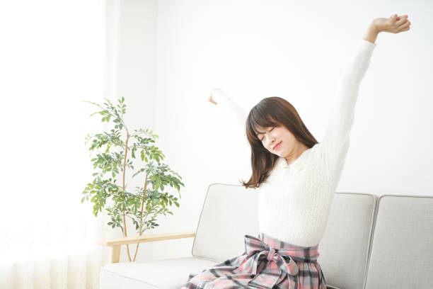 istock Young woman dating at home 666590260