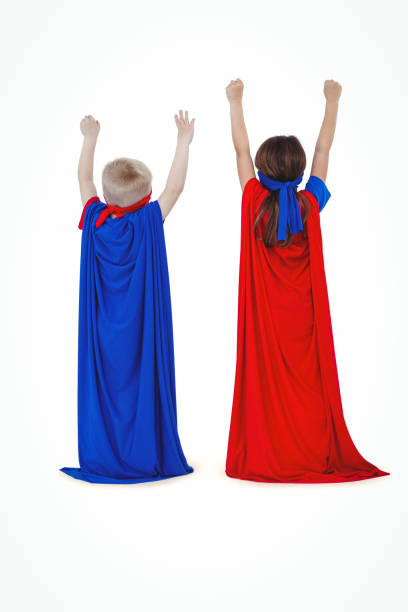 istock Masked kids pretending to be superheroes 666596462