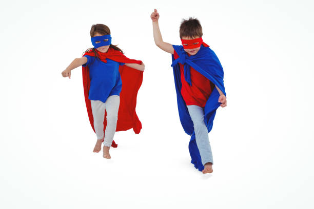 istock Masked kids walking pretending to be superheroes 666597244