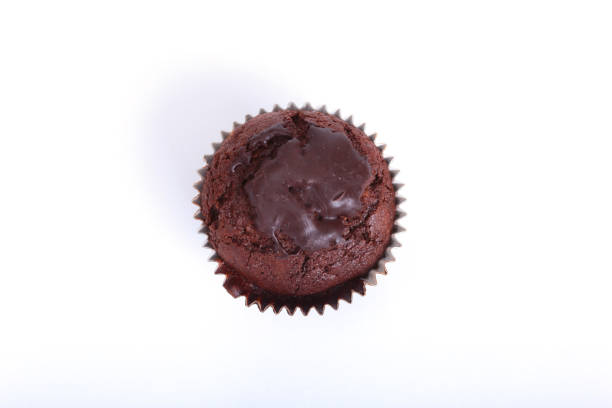 istock Fresh homemade muffins on white background. Top view. 666597418