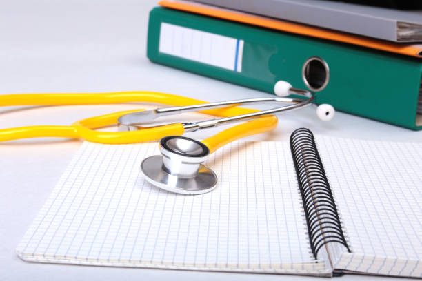 istock Folder file, stethoscope and RX prescription on the desk. blurred background. 666600076