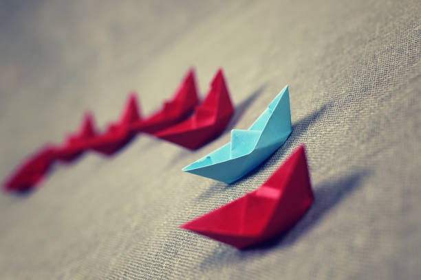 istock colored paper boats 666613616