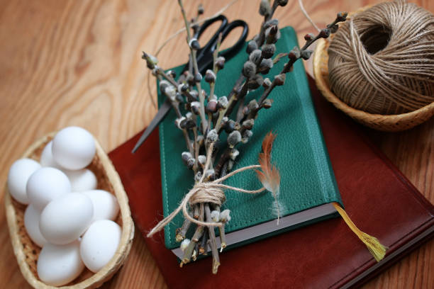 istock willow and egg on a wooden background 666614114