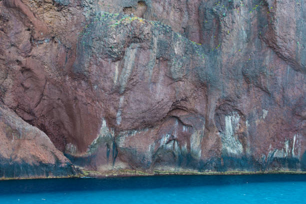 istock Basaltic wall of the coastal cliff 666616900