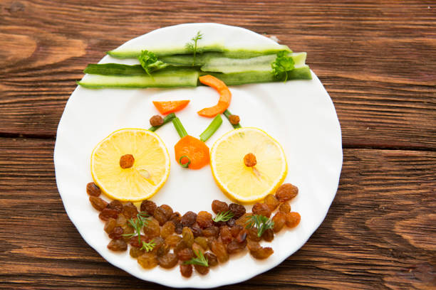 istock Fresh organic vegetables and fruits on dish over rustic background, top view, place for text. Healthy lifestyle concept - vegetable bike on dish on wooden. 666617584