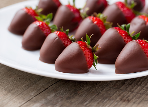 Homemade red strawberries dipped in chocolate