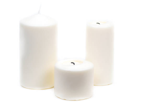 istock a candle is lit in the darkness 666621744