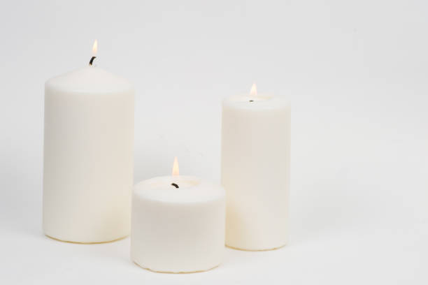 istock a candle is lit in the darkness 666621764