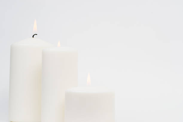 istock a candle is lit in the darkness 666621770