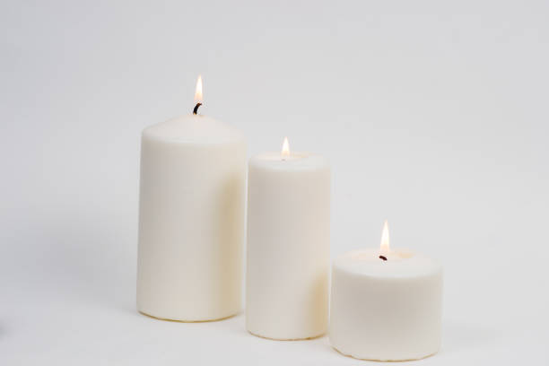 istock a candle is lit in the darkness 666621776