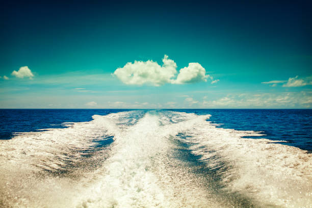 istock Background water surface behind moving motor boat  vintage retro style 666624808