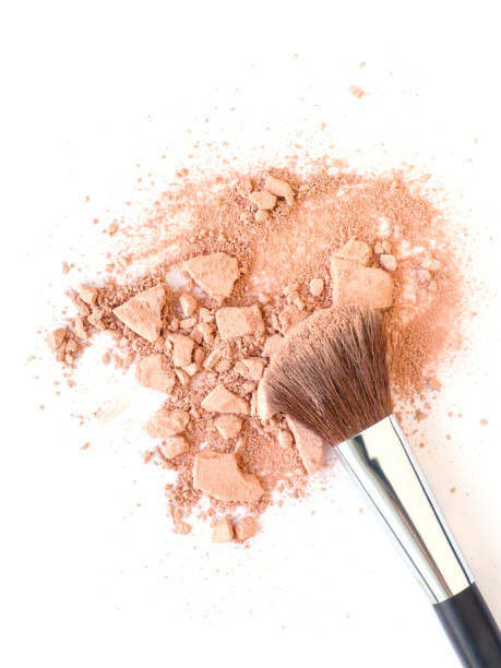 istock Make-up brush and crushed face powder 666630578