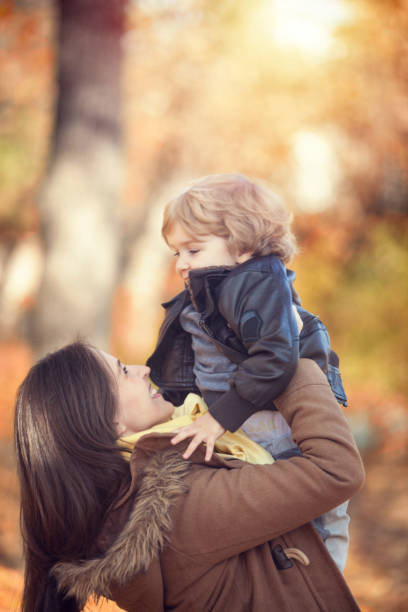 istock Happy mother and son playing. 666630604