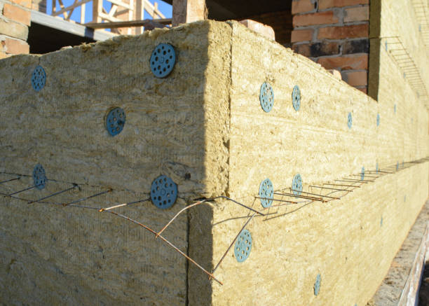istock Exterior wall heat isolation with mineral wool in private house, building under construction 666640726