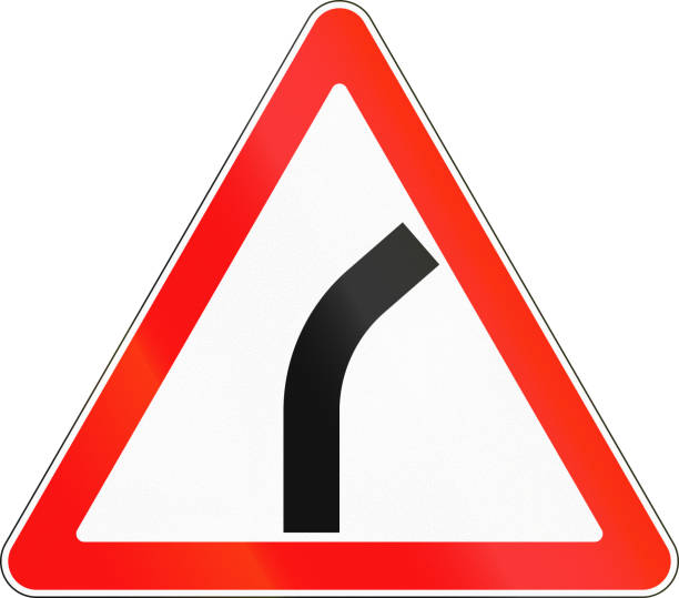 istock Road sign used in Russia - Dangerous bend 666641430