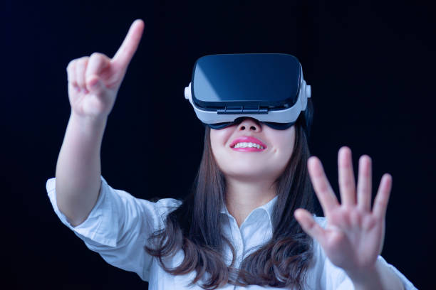 istock Young woman with virtual reality smart glasses. 666645122