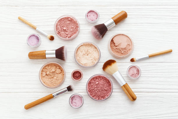 istock Makeup powder products with brushes flat lay 666654076