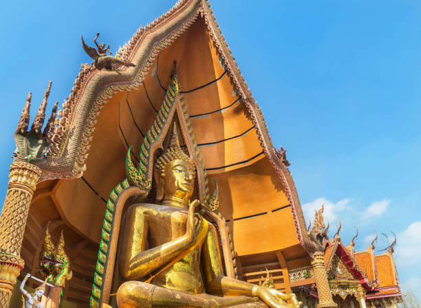 istock big golden buddha statue in Wat Tham Sua buddhist temple 666658498