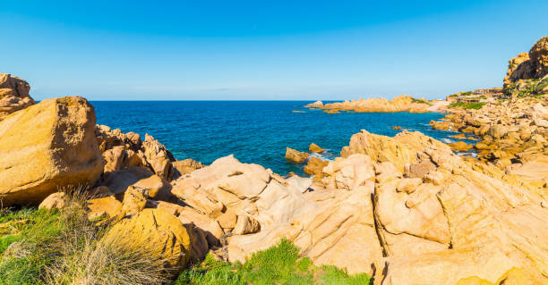 istock Rocks and blue water in Costa Paradiso 666660868