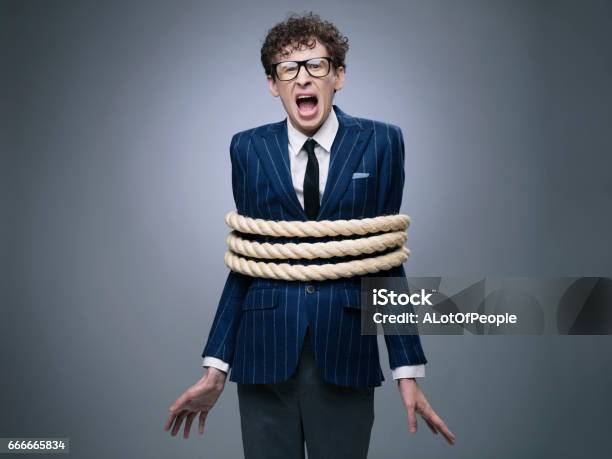 Business Man Tied Up With Rope Stock Photo - Download Image Now - Tied Up, Tying, Rope