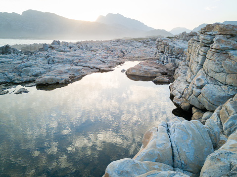 Image over a seaside rock pool