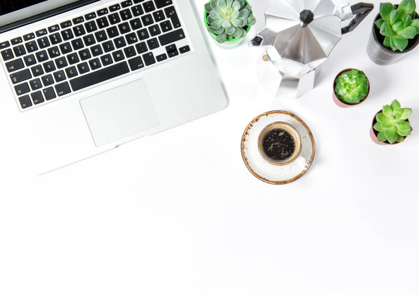 Office workplace Flat lay Coffee laptop succulents