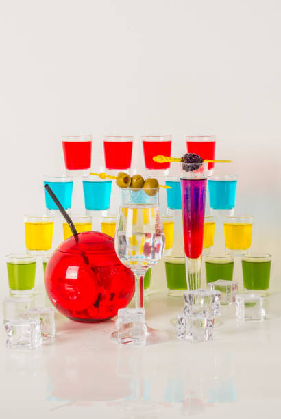 Colorful set of drinks, color drink decorated with fruit, many color kamikaze drink, shot drinks