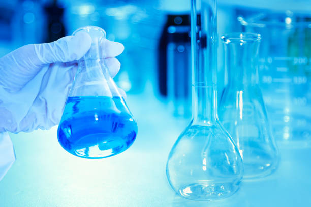 istock scientist with equipment and science experiments ,Laboratory glassware containing chemical liquid, science research,science background and science concept. 666681746