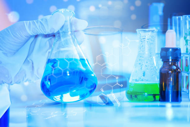 istock scientist with equipment and science experiments ,Laboratory glassware containing chemical liquid, science research,science background and science concept. 666681748