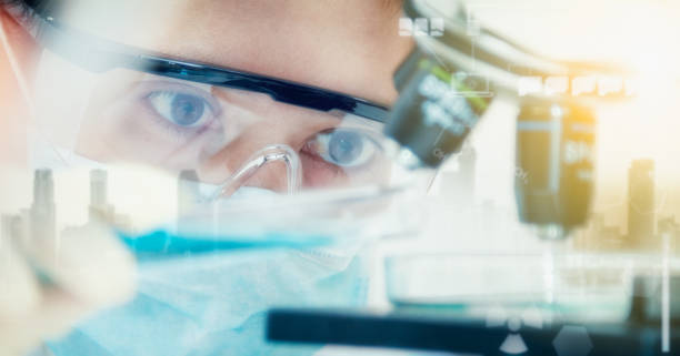 istock Double exposure of scientist with equipment and science experiments ,laboratory glassware containing chemical liquid for design or decorate science or other your content,copy space,mock up. 666682126