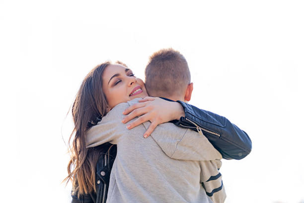 istock Happy little boy hugging his mother 666682522