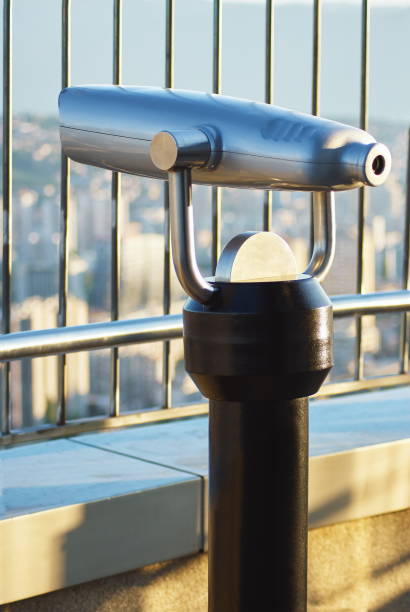 istock Coin Operated Telescope Binocular For Sightseeing on skyscraper observation deck 666682812