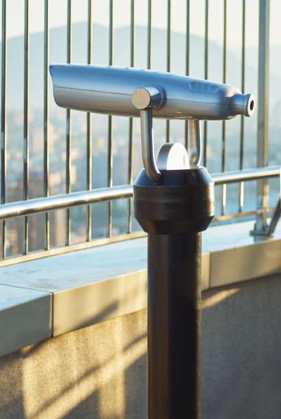 istock Coin Operated Telescope Binocular For Sightseeing on skyscraper observation deck 666682856