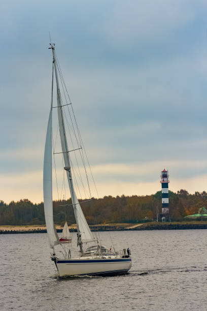 istock White sailboat traveling 666689298